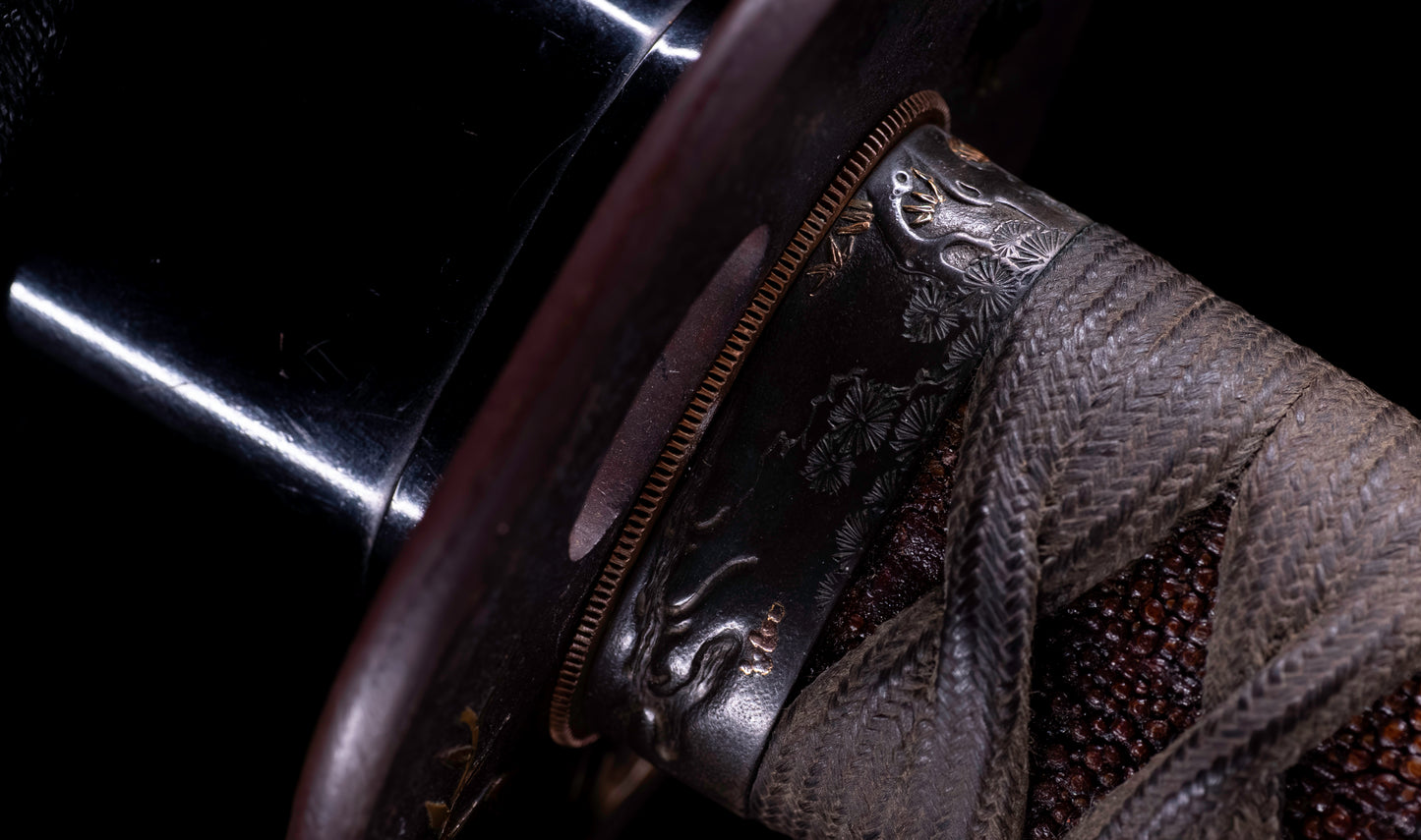 Katana japonesa antigua, tsuba Ave acuática firmado Awataguchi